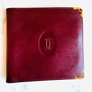CARTIER Paris Burgundy Leather Slim Bifold Wallet Gold Corner Guards Unisex